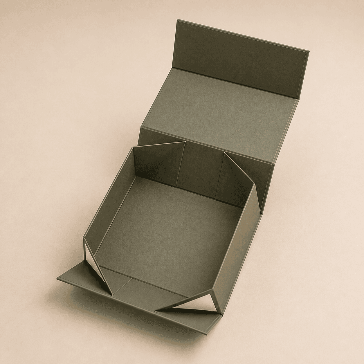 Overhead view of a collapsible magnetic box being assembled